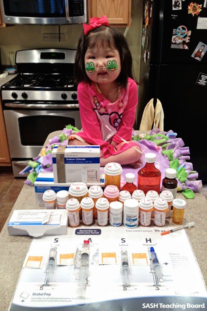 Lily-with-her-post-transplant-medicationsedit